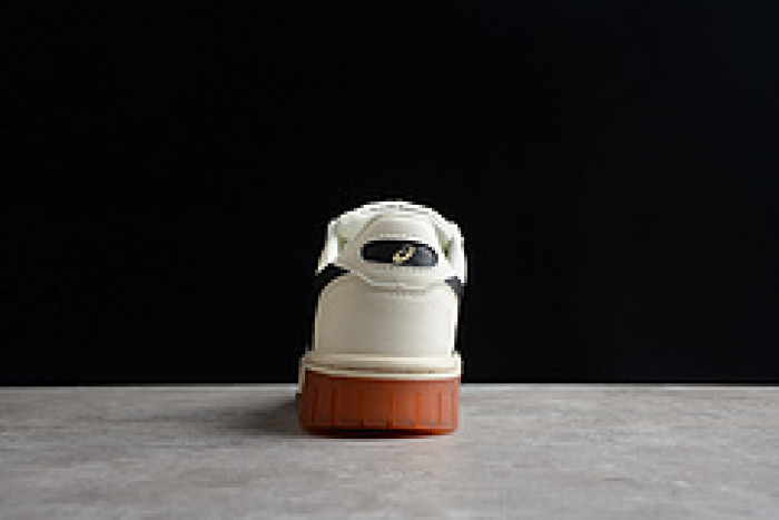 As*ic*s sneaker